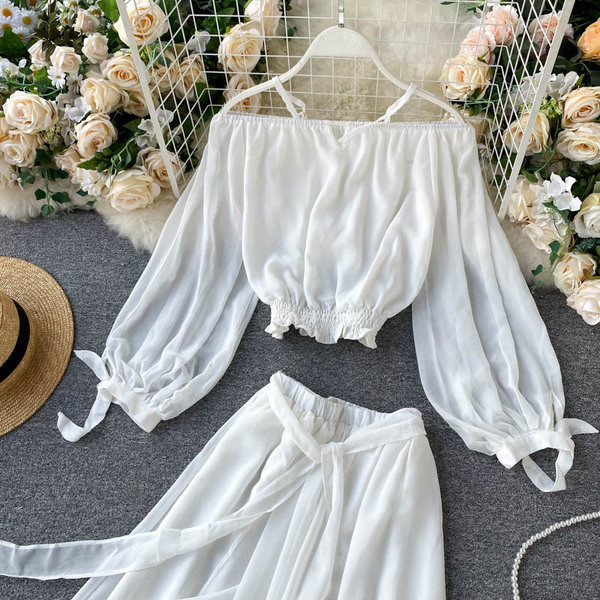 Valge naiste pluusi ja pika seeliku komplekt