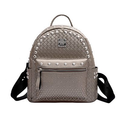 Кожена дамска раница с метални капси 