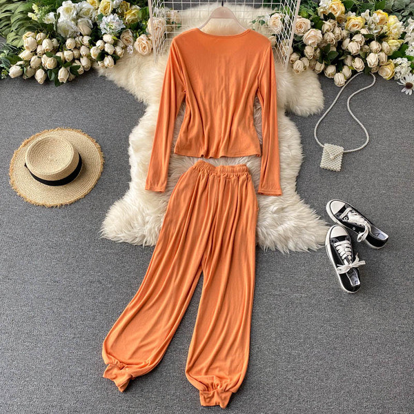 Дамски комплект от панталон, потник и жилетка