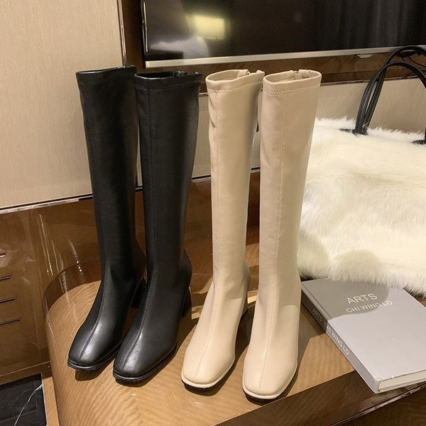 Стилни дамски ботуши от еко кожа с нестандартен ток