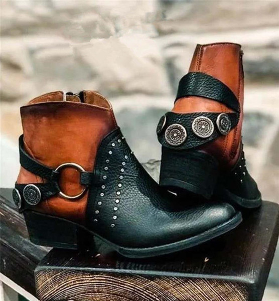 Model ženskih čizama na špic s metalnim ukrasom