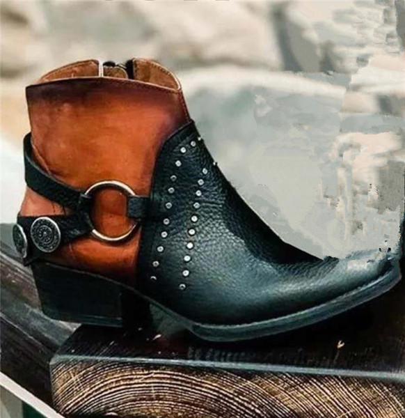 Model ženskih čizama na špic s metalnim ukrasom