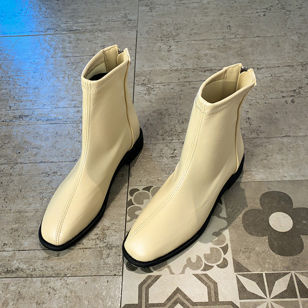 Naiste vabaaja saapad lameda tallaga - ökonahk