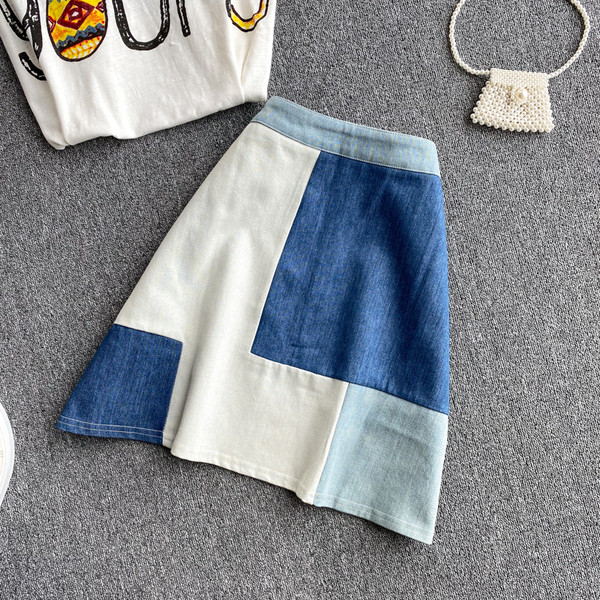 Naiste lühikeste varrukatega pluusi ja kõrge vöökohaga seeliku komplekt