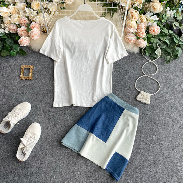 Naiste lühikeste varrukatega pluusi ja kõrge vöökohaga seeliku komplekt