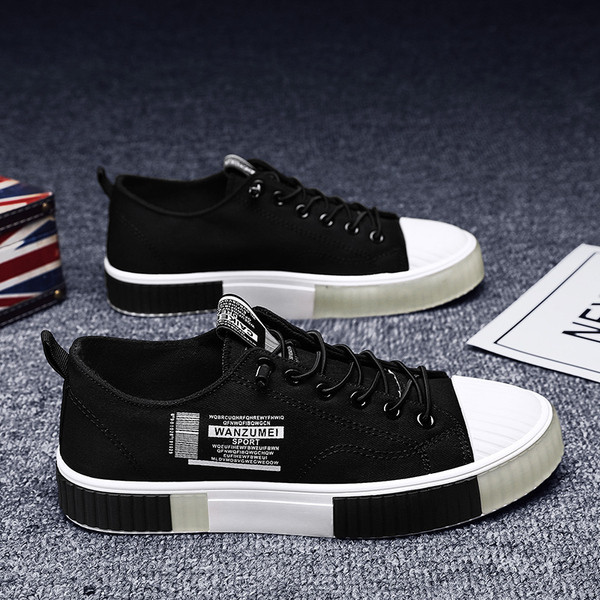 Muške tekstilne tenisice sa natpisima i vezicama