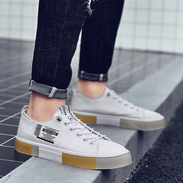 Muške tekstilne tenisice sa natpisima i vezicama