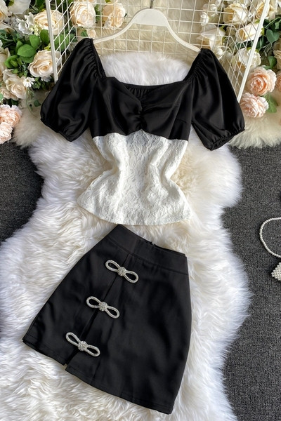 Női szett kétszínű blúzból és szoknyából, szalagokkal