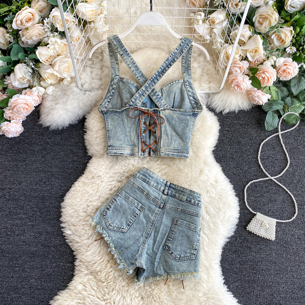 Női farmer felső cipzárral és megkötős nadrággal