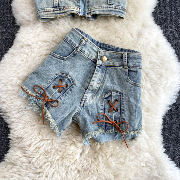 Női farmer felső cipzárral és megkötős nadrággal