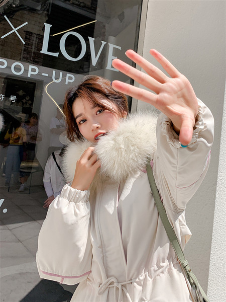 ÚJ női téli kabát széles modell pehely és zsebekkel