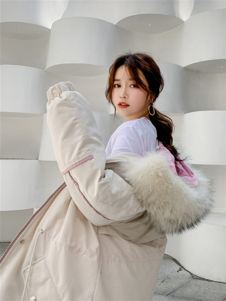 ÚJ női téli kabát széles modell pehely és zsebekkel