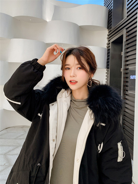 ÚJ női téli kabát széles modell pehely és zsebekkel