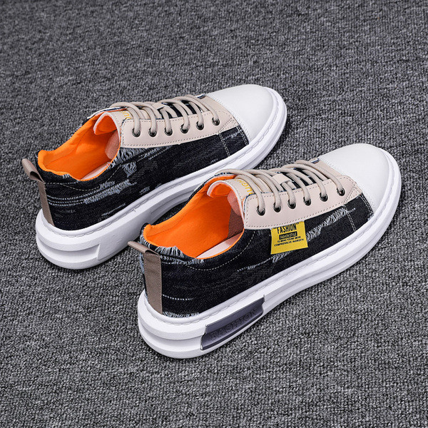 Rebitud motiivide ja kõrge tallaga meeste teksased tossud