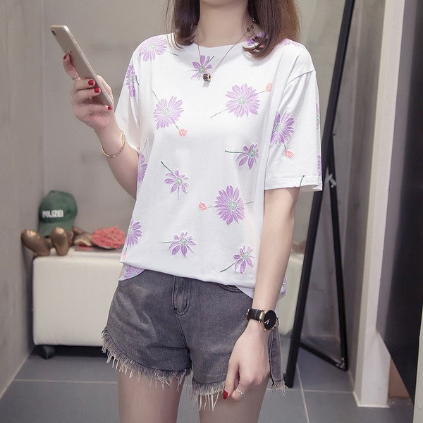 Női póló rövid ujjú fehér és sárga színben, virágmintával