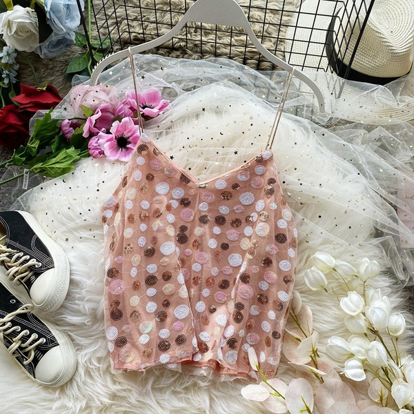 Modern női felső vékony pántokkal és flitterekkel