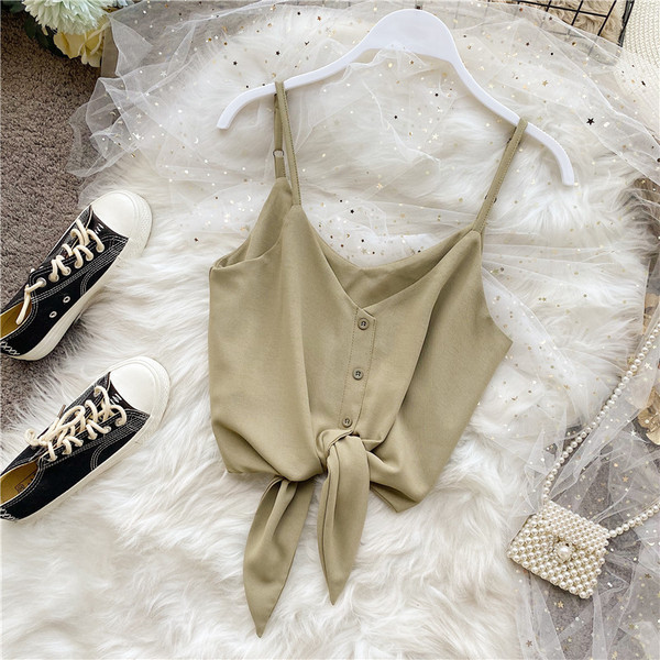 Modern női felső vékony pántokkal és spitz nyakkivágással