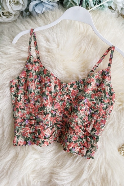 Modern női felső, virágmintával és ovális nyakkivágással