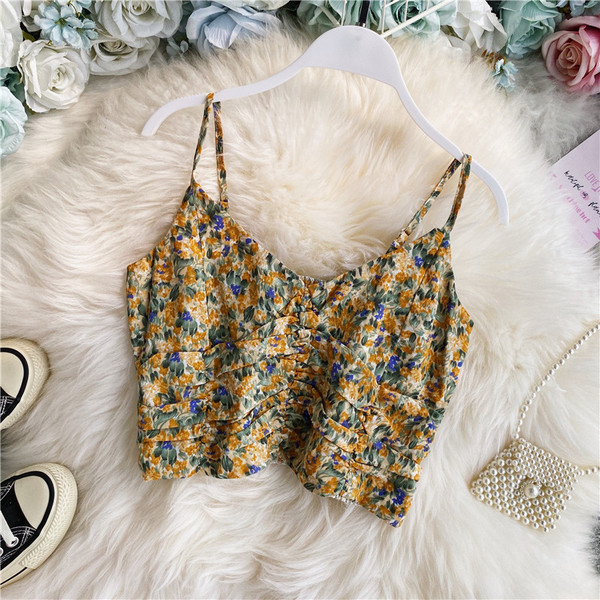 Modern női felső, virágmintával és ovális nyakkivágással