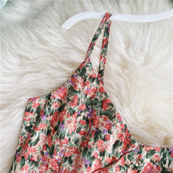 Modern női felső, virágmintával és ovális nyakkivágással