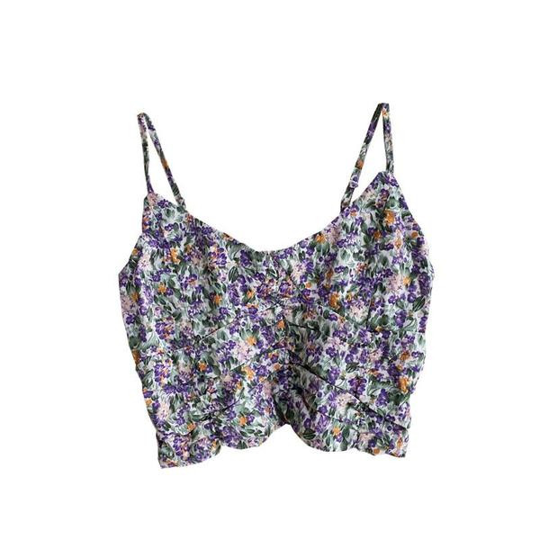 Modern női felső, virágmintával és ovális nyakkivágással