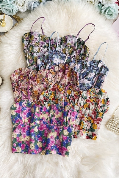 Lillemustri ja peenikeste rihmadega moodne naiste rinnakas