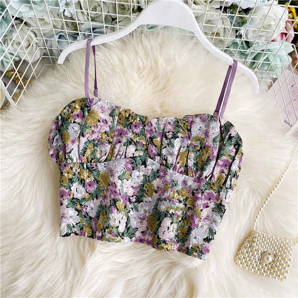 Lillemustri ja peenikeste rihmadega moodne naiste rinnakas