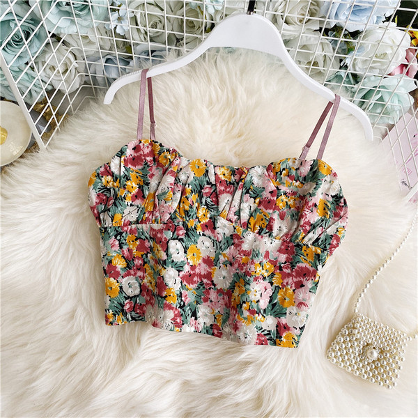 Lillemustri ja peenikeste rihmadega moodne naiste rinnakas