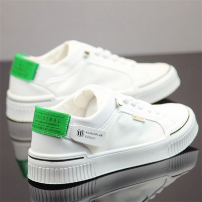 Platnene muške tenisice s natpisima i ravnim đonom