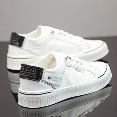 Platnene muške tenisice s natpisima i ravnim đonom