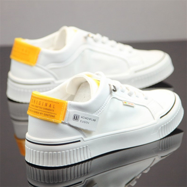 Platnene muške tenisice s natpisima i ravnim đonom