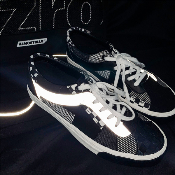 Lameda tallaga meeste tossud, must-valged