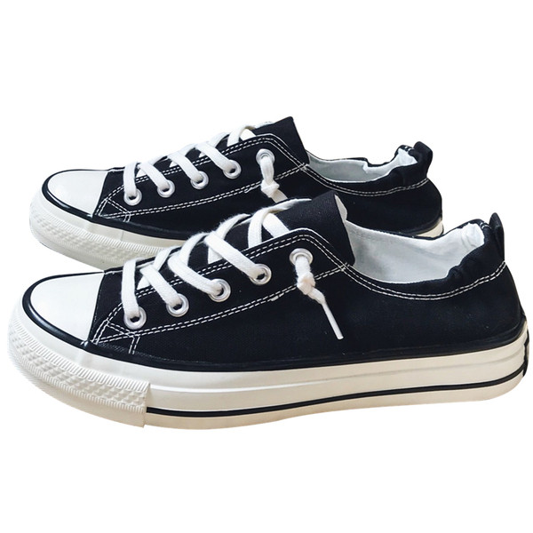 Meeste lõuendist tossud paelte ja lameda tallaga