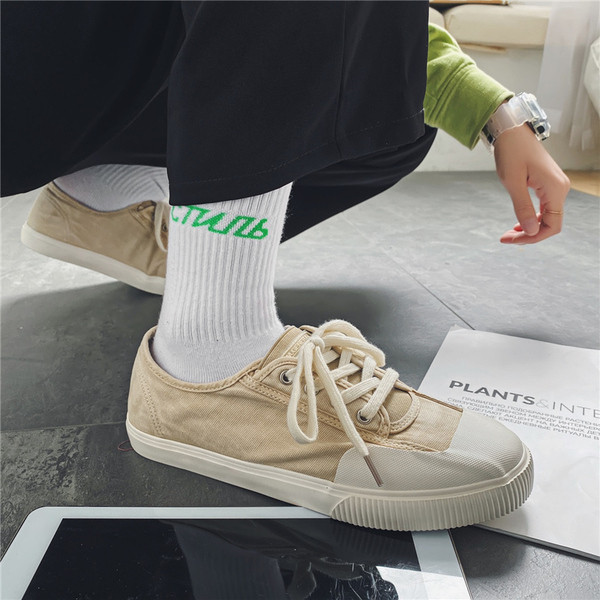 Lameda talla ja paeltega vabaaja tekstiilist meeste tossud