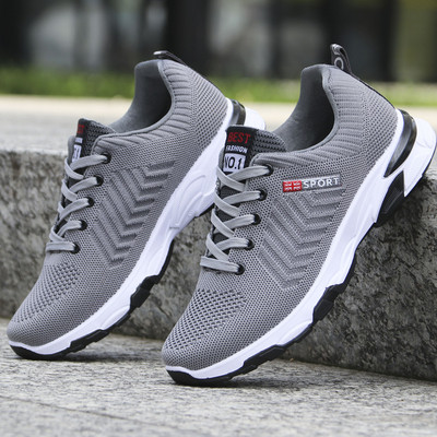 Meeste vabaaja tossud halli ja musta tekstiilist