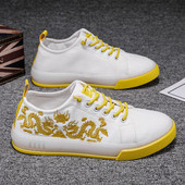 Moodsad meeste tossud lameda talla ja tikandiga