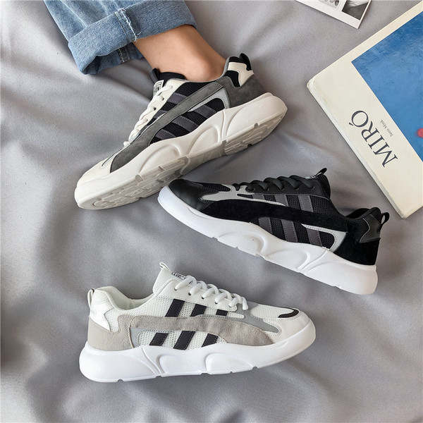 Sportlikud ja vabaaja meeste tossud seemisnahast elemendiga