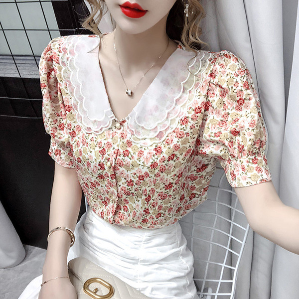 Elegantna ženska košulja s cvjetnim uzorkom i kratkim rukavima