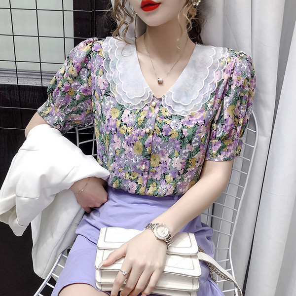 Elegantna ženska košulja s cvjetnim uzorkom i kratkim rukavima