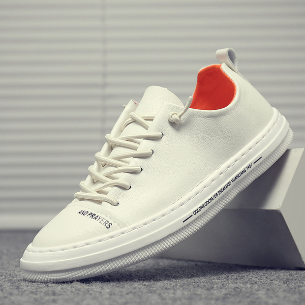 Jesenske kožne tenisice s natpisima i vezicama