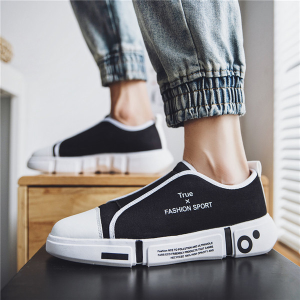 Kummiga meeste tekstiilist tossud