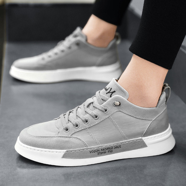 Lameda talla ja kirjadega meeste kunstnahast tossud