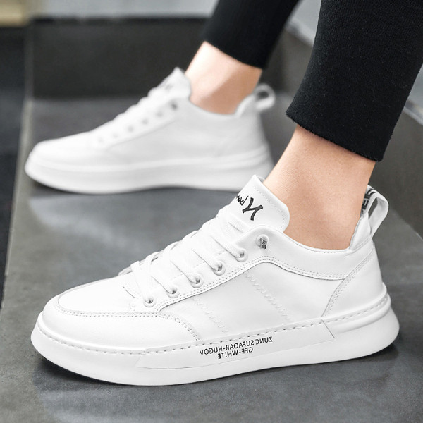 Lameda talla ja kirjadega meeste kunstnahast tossud