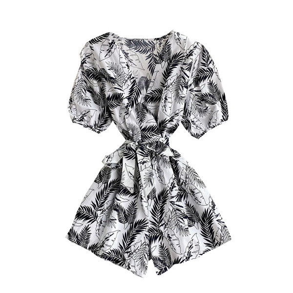 Lillemustri ja spitsikaelusega moodne naiste kombinesoon