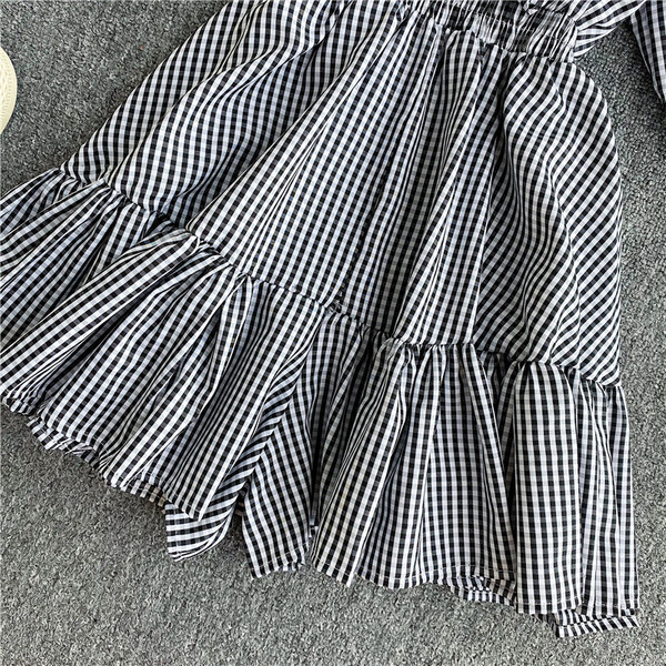 Modern női kockás overál spitz nyakkivágással