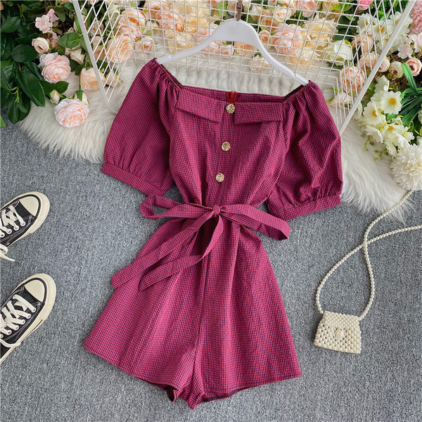 Női modern rövid jumpsuit gombokkal