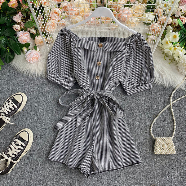 Női modern rövid jumpsuit gombokkal