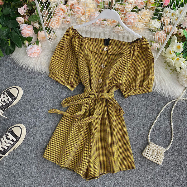 Női modern rövid jumpsuit gombokkal