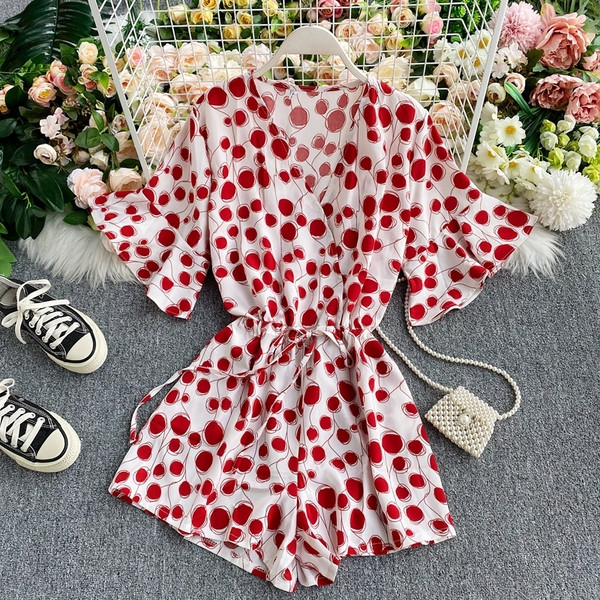 Stílusos női rövid jumpsuit nyakkendővel és spitz nyakkivágással