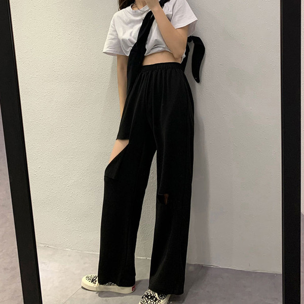 Női alkalmi nadrág magas derékkal, szakadt motívumokkal